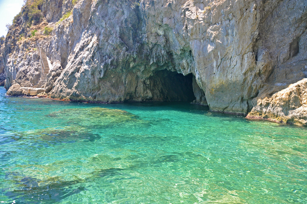 Gavitella Beach has grottos off the coast that you can explore.