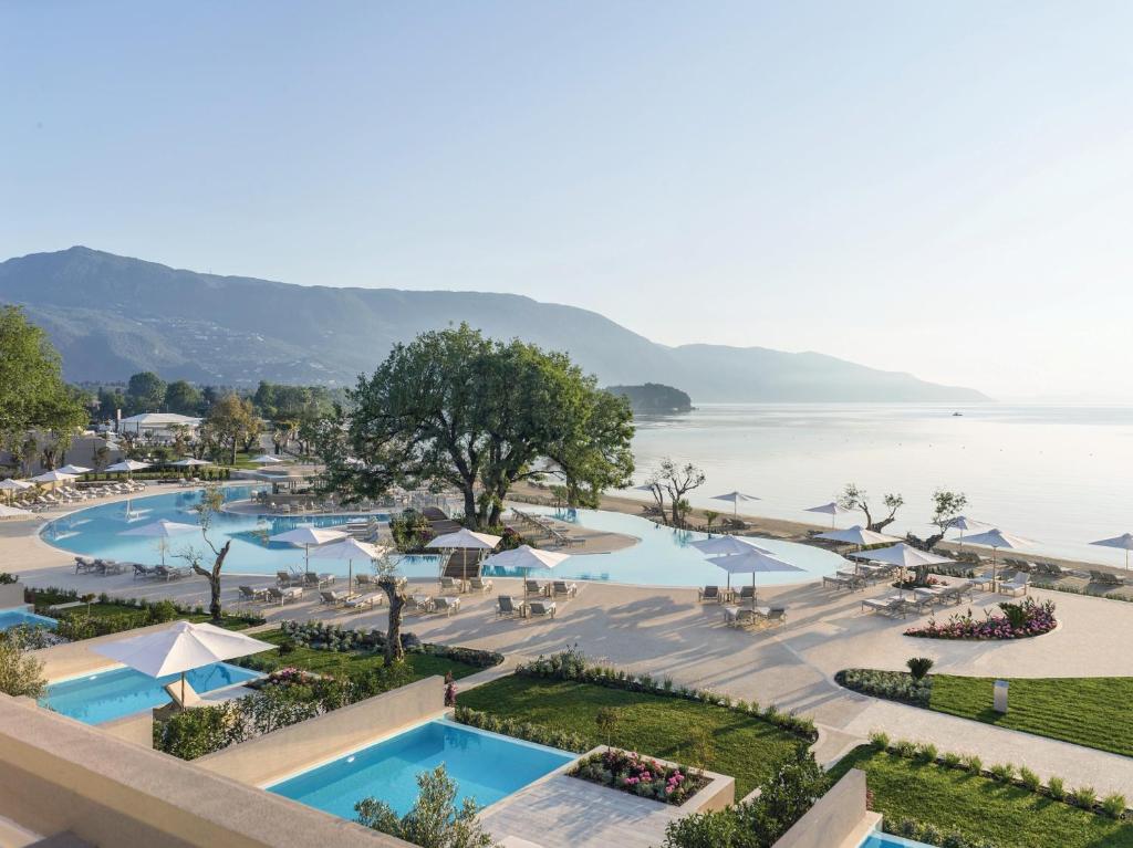 View of hotel pool in front of the beach with private pools in the foreground. This is one of the best adults only all inclusive resorts. 