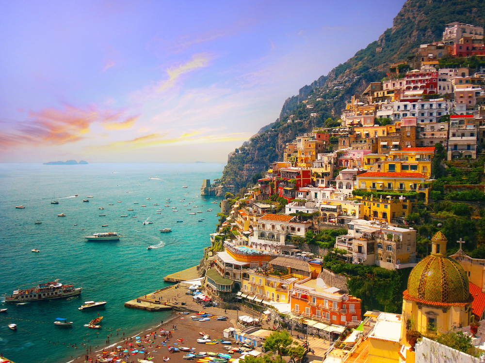 the town of Positano showing the beach, sea and the houses up the mountain. It is one of the best beach towns in Europe. 