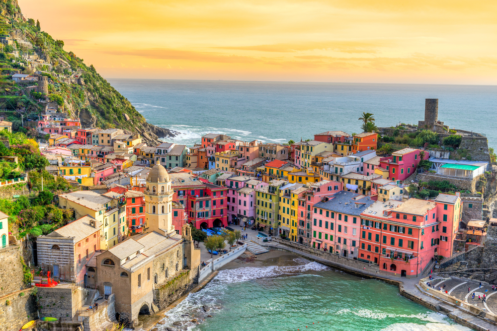 Vernazza fishing village, seascape in Five lands, Cinque Terre National Park, Liguria, Italy. You can see the fort in the distance and the brightly colored buildings. 