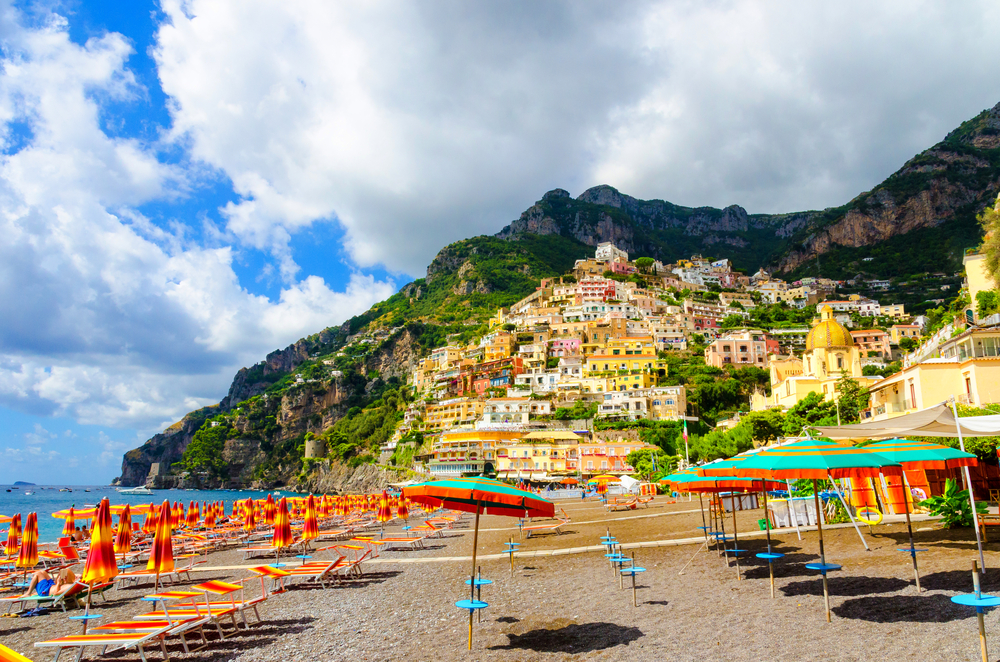the picturesque town of Santa Croce is a beach town with umbreallas
