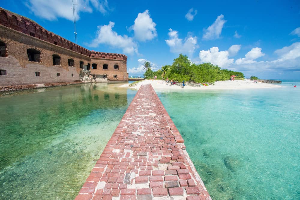 Dry Tortugas National Park features forts for exploring, white sand islands, and clear waters.