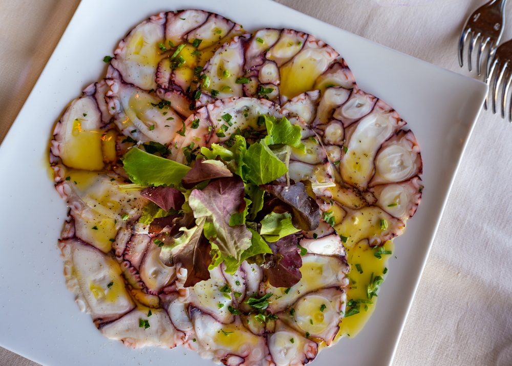 a plate of octopus carpaccio in Capri