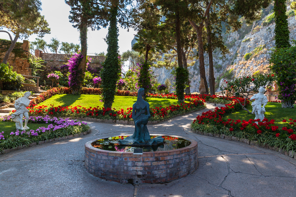 the Augusto Gardens are must see on your Amalfi Coast itinerary with statues and amazing colorful flowers