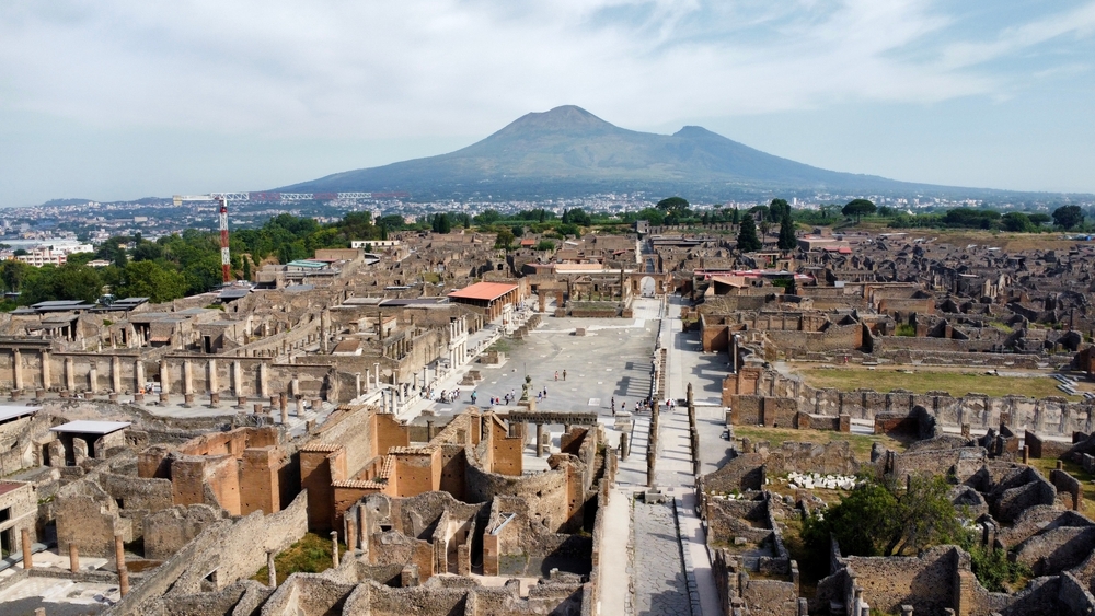the historic city of r Pompeii  on an Ariel view with mount Vesuvius in the background