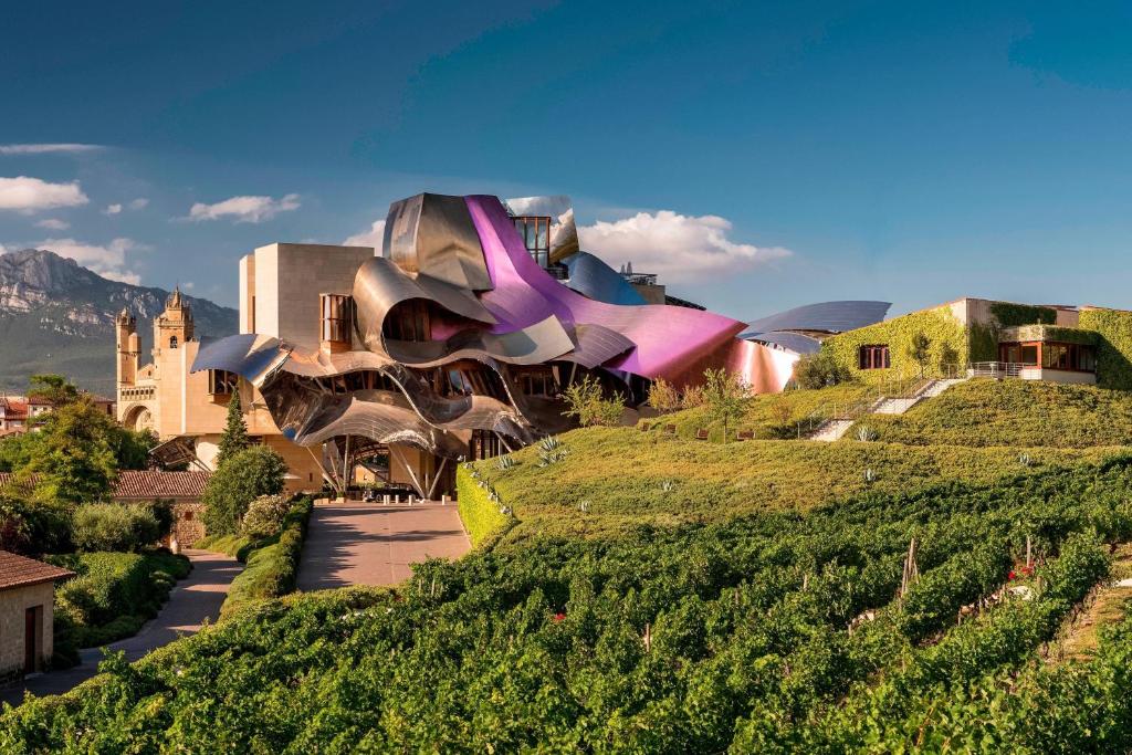 One of the most unique and best Marriott hotels in the world. you can see a building with curves and zig zags around it creating a really unusual structure. 