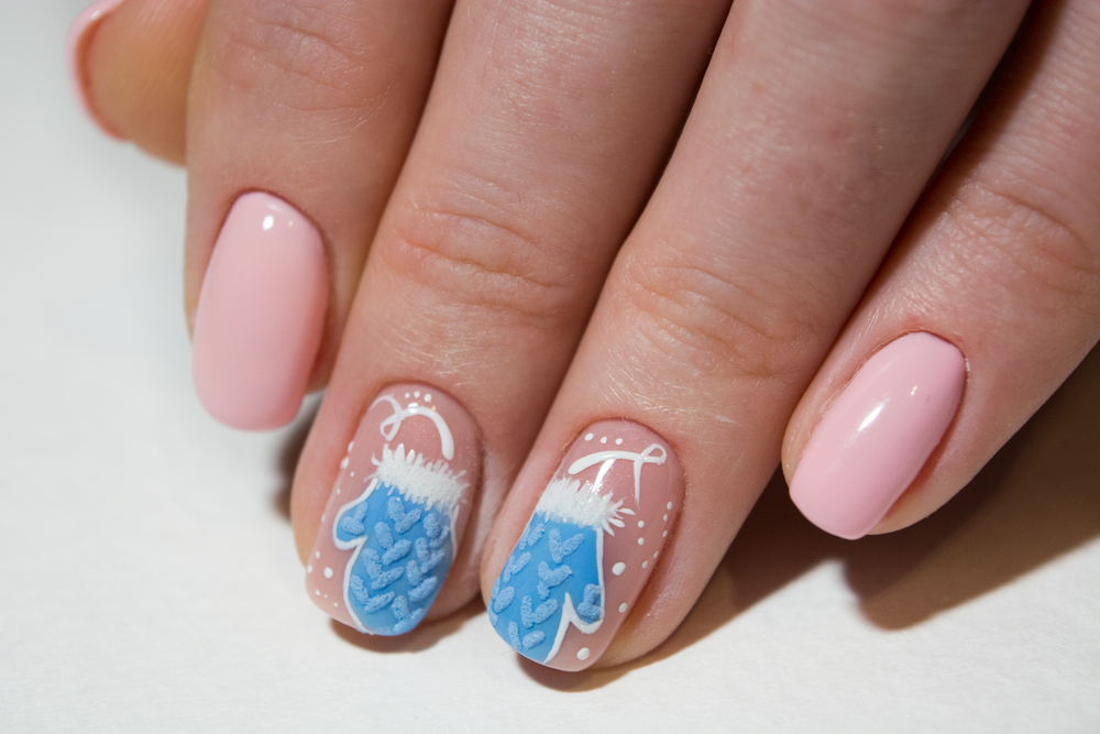 Christmas nails with mittens on. Festive Christmas Nail Ideas