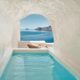 Plunge pool in a cave overlooking the ocean. This is one of the best luxury hotels in Greece.