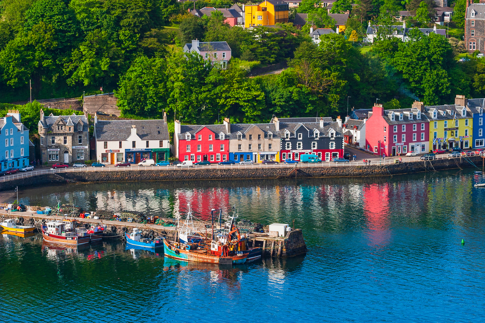 Tobermory, Isle of Mull, The colourful houses of Tobermory in Summertime, overlooking the bay with fishing boats and lobster creels.