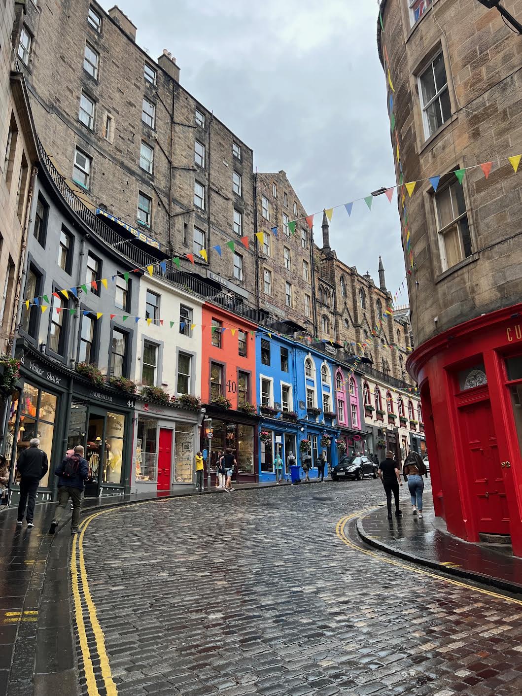 avoid driving on the narrow cobblestone street surround by colorful buildings not eh royal miles
