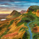 Beautiful sunrise sky over rock formations on the Quiraing, an ancient landslip on the eastern face of Meall na Suiramach on the Ilse of Skye in Scotland. The article is about Buy From Amazon Before Scotland.