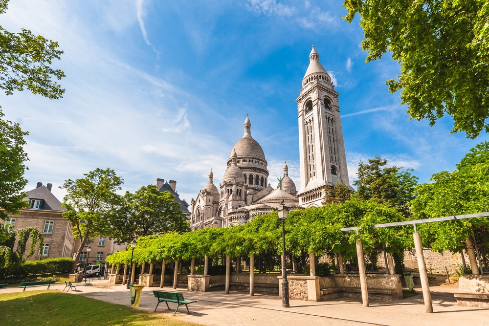 In a nearby park and castle, the greens of threes and vines stand out against stone architecture: hidden gems like this can be found in guidebooks which is one of those things to buy from Amazon for Paris.