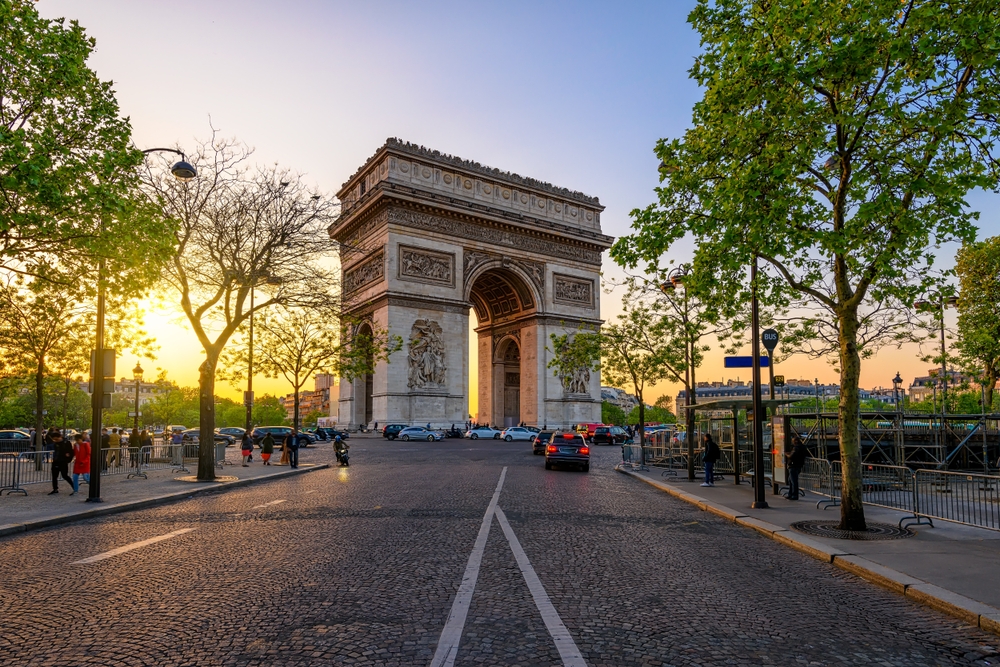 At sunset (or sunrise), traffic stalls around Paris' famous arc in the middle of their round a bout.