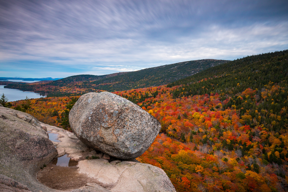 Bubble Rock, South Bubble Mountain in Fall | Acadia National Park, Maine, USA. The article is about fall foliage weekend getaways.