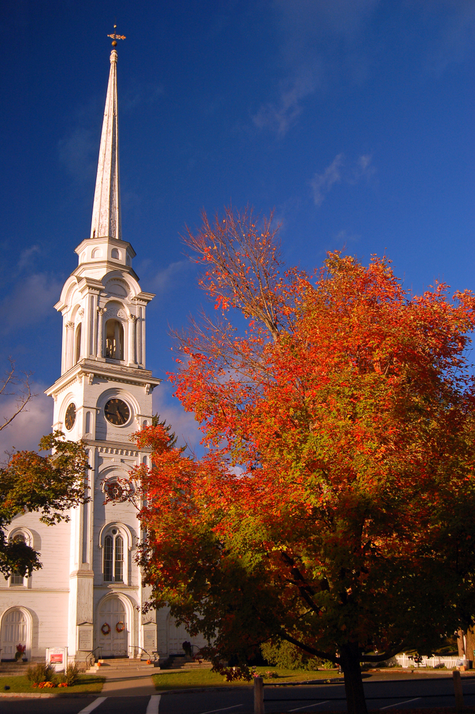 Colors compliment a traditional New England church in Lenox, Massachusetts