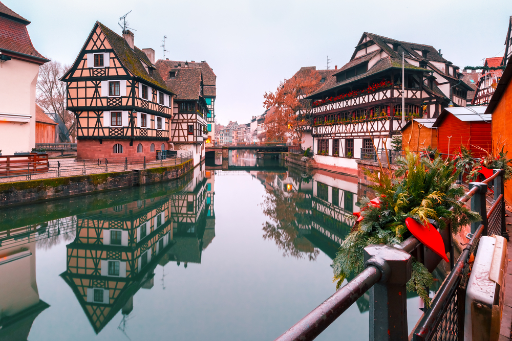 The Strasbourg Christmas Market with its wooden timbered houses on the river is picturesque at christmas time