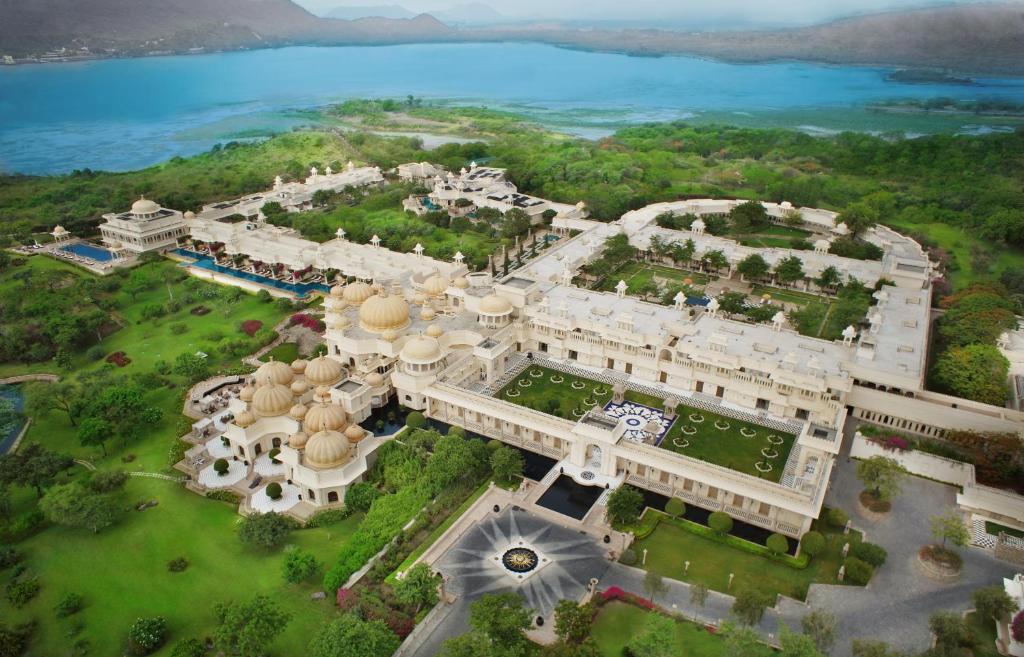 The Oberoi Udaivilas in India is a huge castle and palace with acres of land and pristine greens and classic architecture.