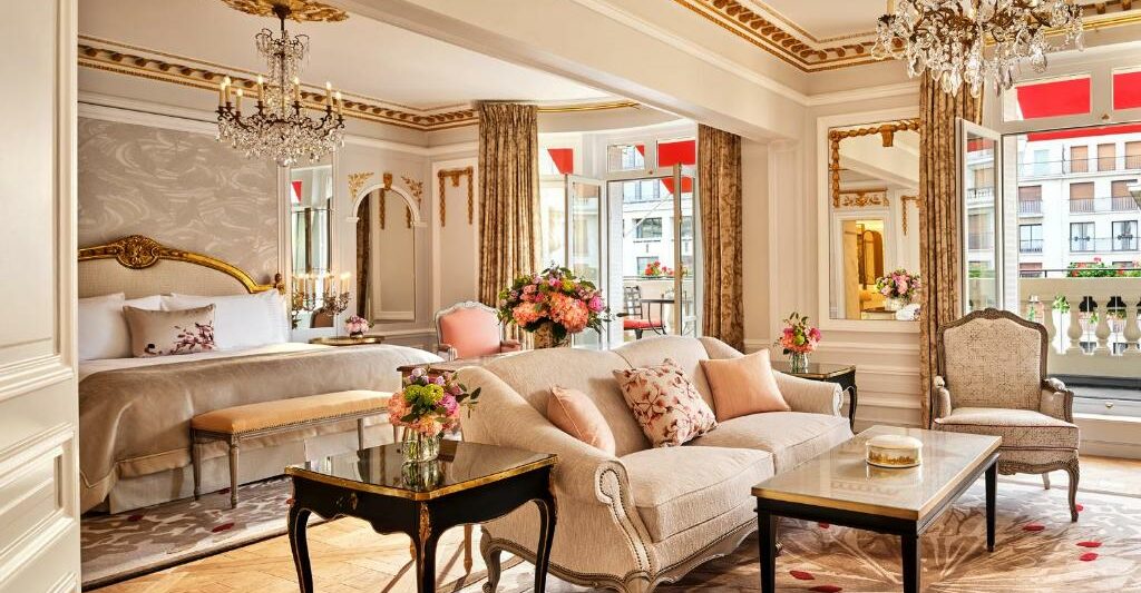 The Hotel Plaza Athenee in Paris is one of the 10 Most Luxurious Hotels to Spend Christmas Around the World, with its ornate red and gold decor that lines the suites: the windows overlook Paris!