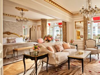 The Hotel Plaza Athenee in Paris is one of the 10 Most Luxurious Hotels to Spend Christmas Around the World, with its ornate red and gold decor that lines the suites: the windows overlook Paris!