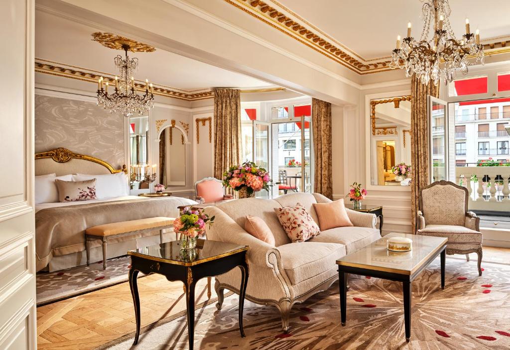 The Hotel Plaza Athenee in Paris is one of the 10 Most Luxurious Hotels to Spend Christmas Around the World, with its ornate red and gold decor that lines the suites: the windows overlook Paris!