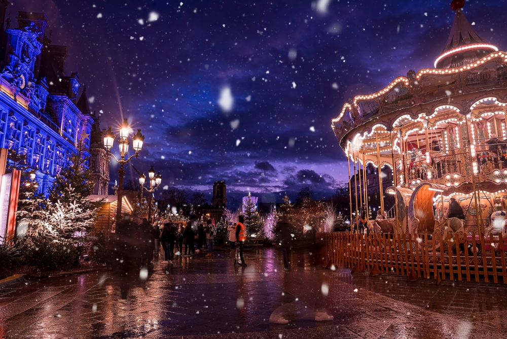 paris is one of the best European Christmas Markets with a carousel in front of the Hotel du Ville
