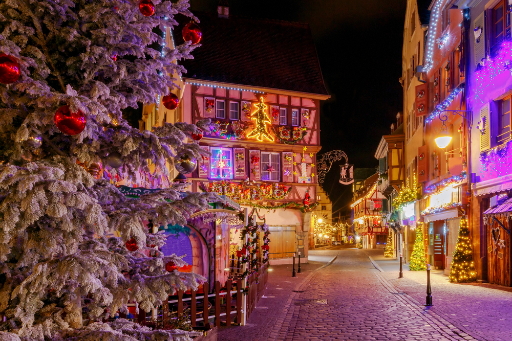 The city of Colmar decorated with lights at Christmas time with a dusting of snow