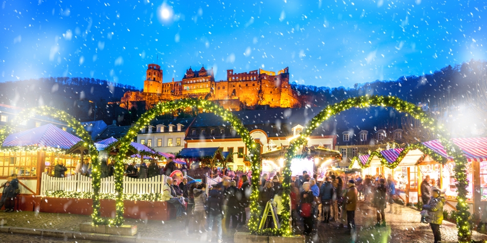 the vibrant Christmas market under the castle in Heidelberg in Germany is one of the must visit European Christmas Markets