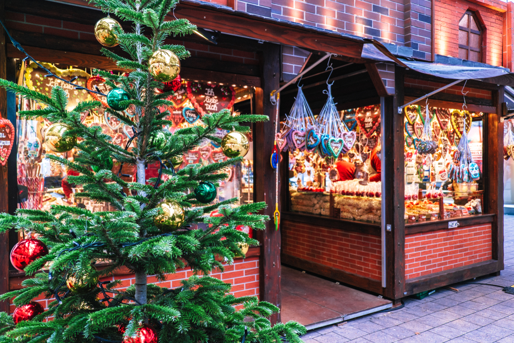 a wooden stall selling gingerbread cookeis at nuremberg christmas market